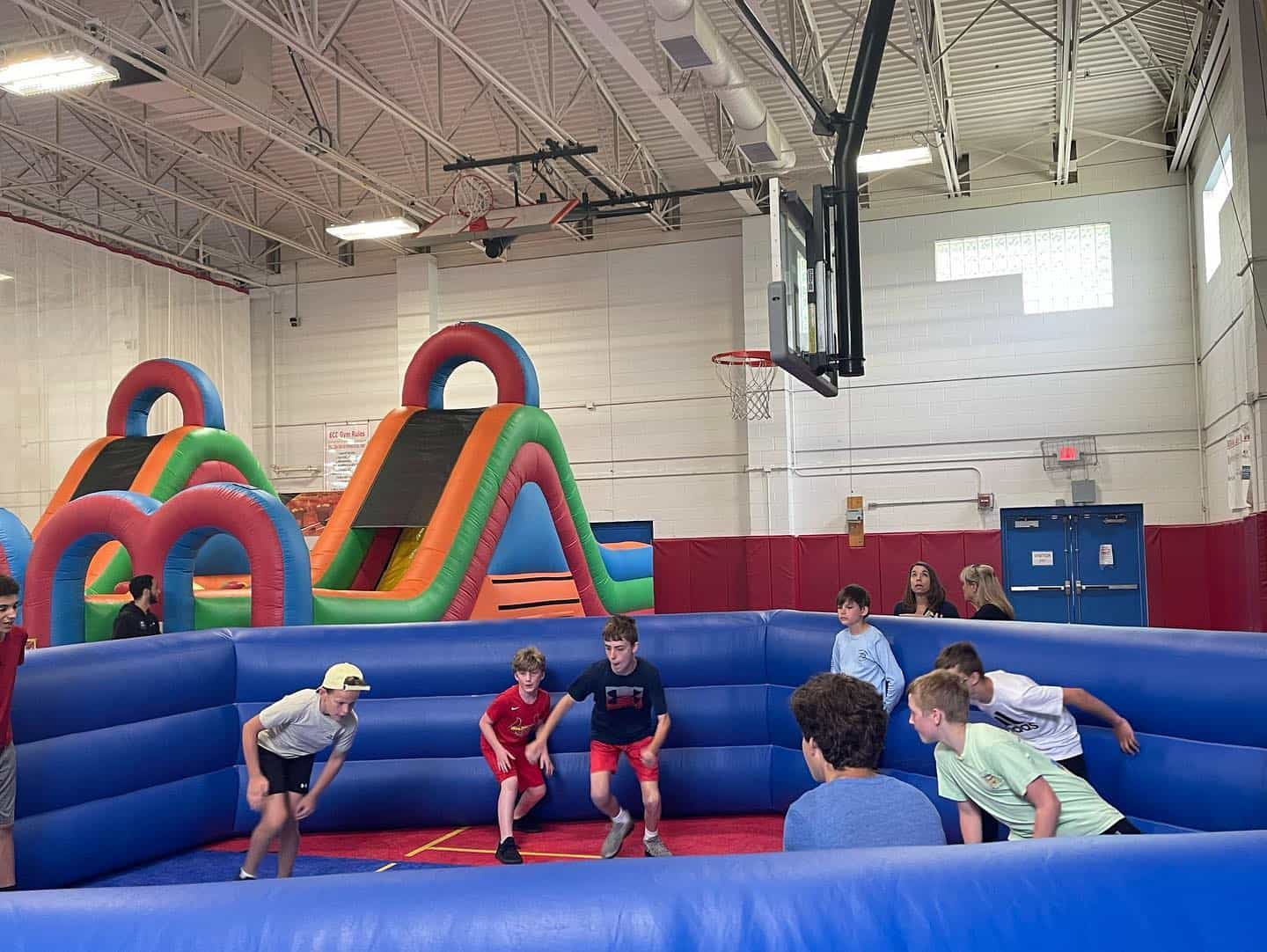 a group of people in a gym