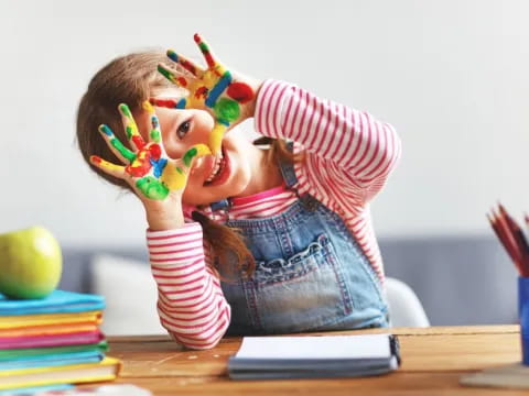 a child holding a toy