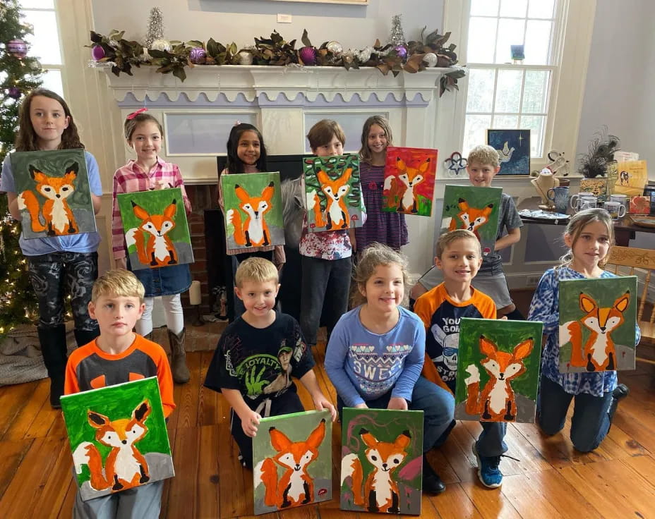 a group of children posing for a photo