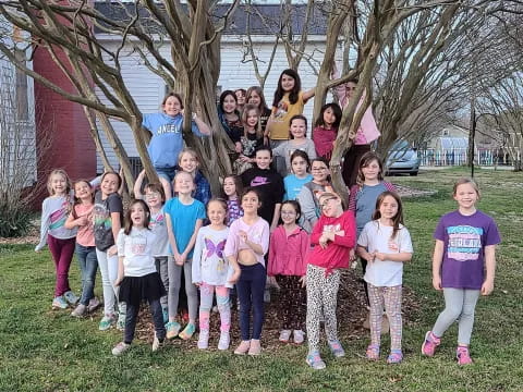 a group of children posing for a photo