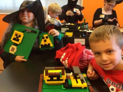 a group of children playing with toys