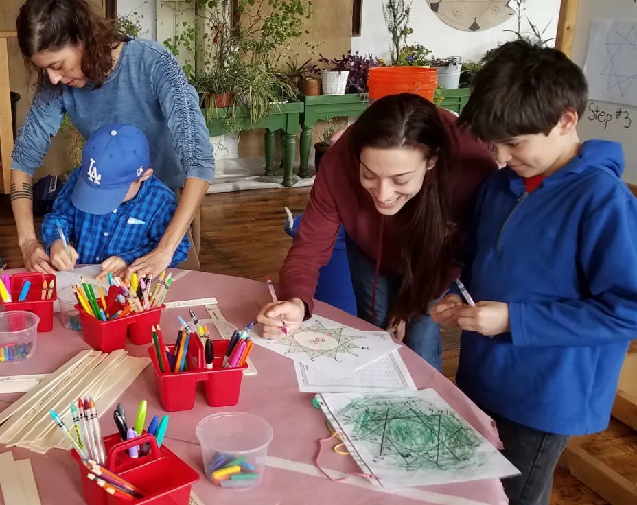 a group of people playing with toys