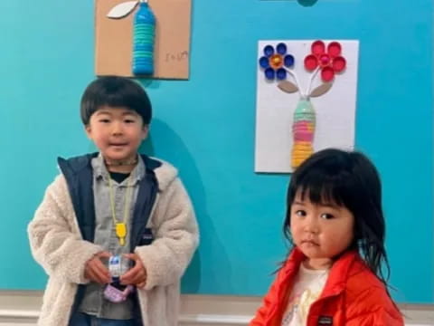 a boy and girl posing for a picture