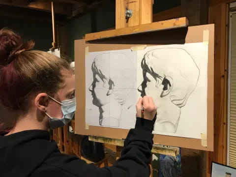 a person drawing a picture