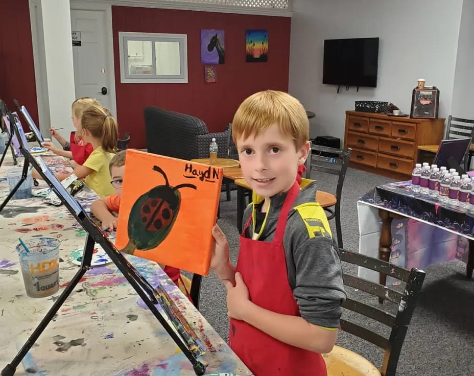 a boy holding a flag