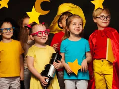 a group of children wearing clothing