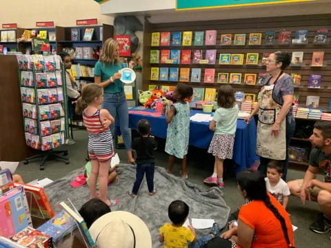 a group of children in a library