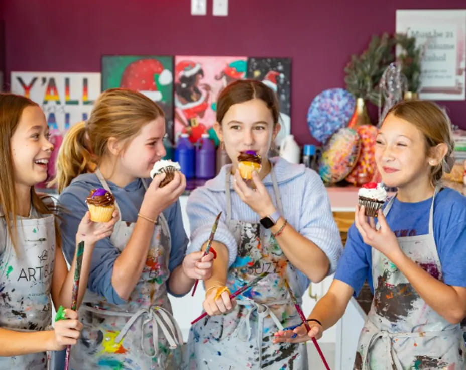 a group of girls holding ice cream cones