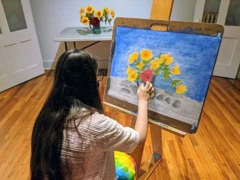 a person painting a picture