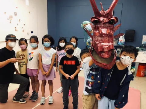 a group of people wearing masks