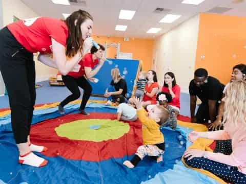 a group of people on a mat