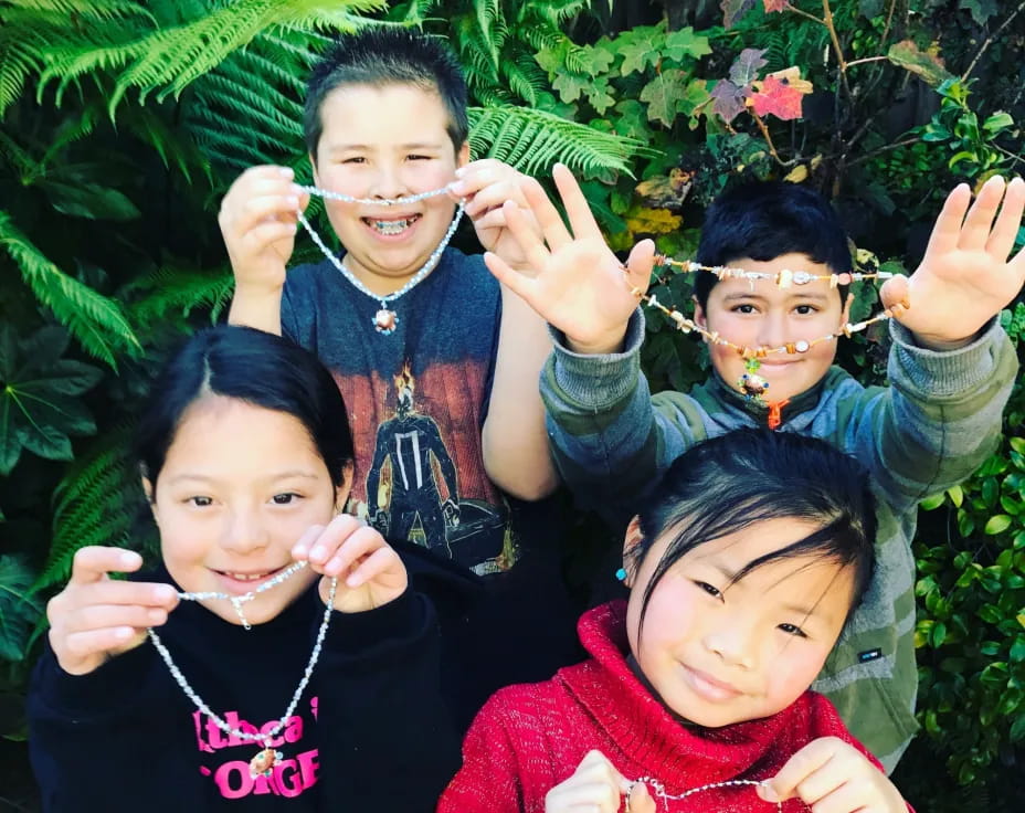 a group of children posing for a photo