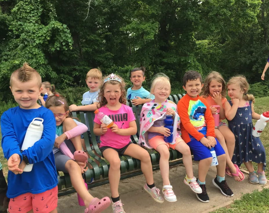 a group of children posing for a photo