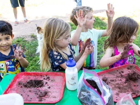 a group of children eating food