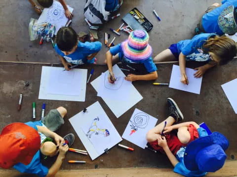 a group of children doing art