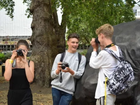 a group of people taking pictures