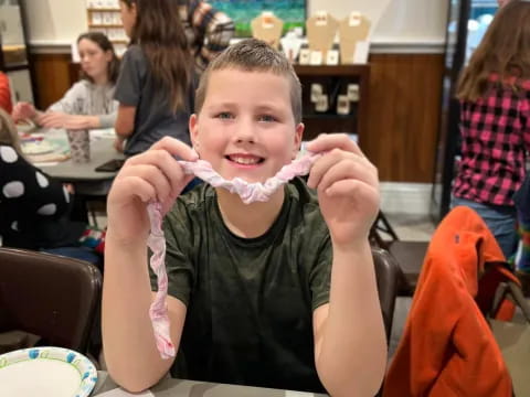 a child with a toothbrush in their mouth