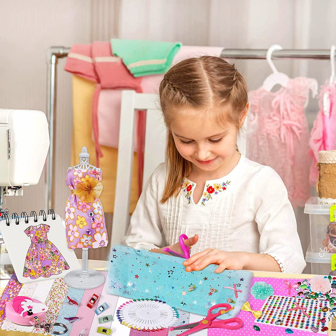 a girl sitting at a table with a birthday cake