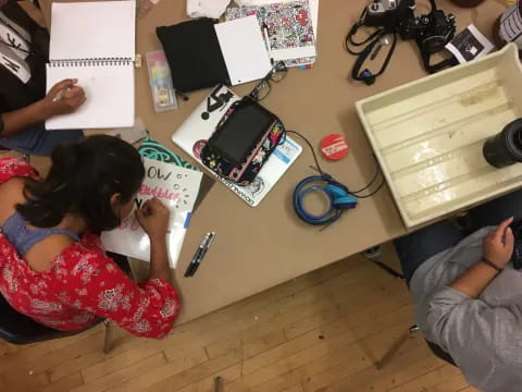 a person sitting at a desk