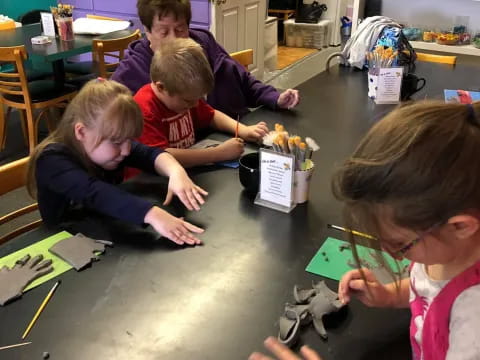 a group of children playing with toys