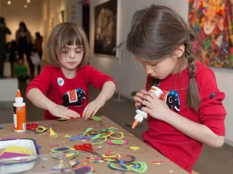 a couple of girls playing with toys