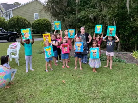 a group of children holding up signs