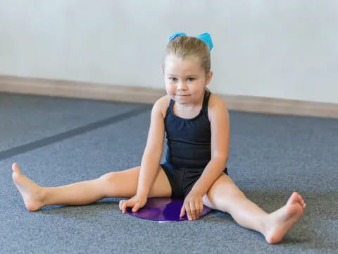 a girl sitting on the floor