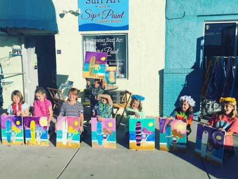 a group of children sitting on a bench