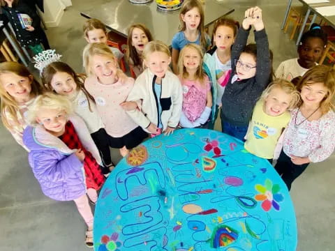 a group of children posing for a photo