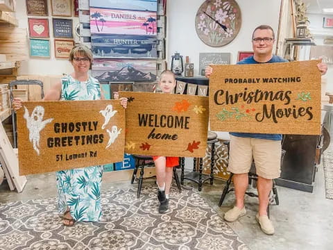 a group of people holding signs