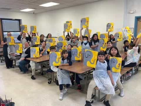 a group of children in a classroom