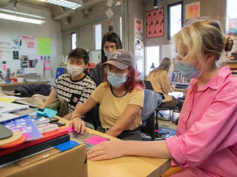 a group of people in a classroom