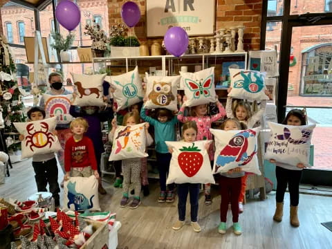 a group of children holding signs