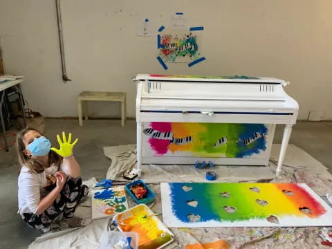 a child painting on the floor