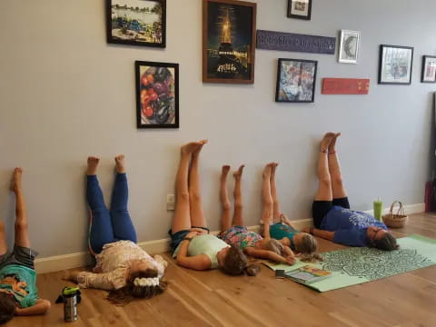 a group of people doing yoga