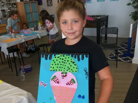 a boy holding a sign