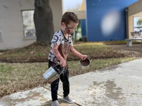 a man holding a bucket