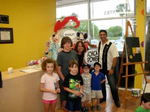 a group of people posing for a photo