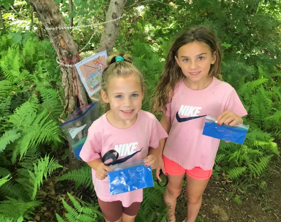 two girls in pink shirts