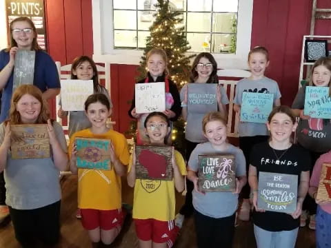 a group of children posing for a photo