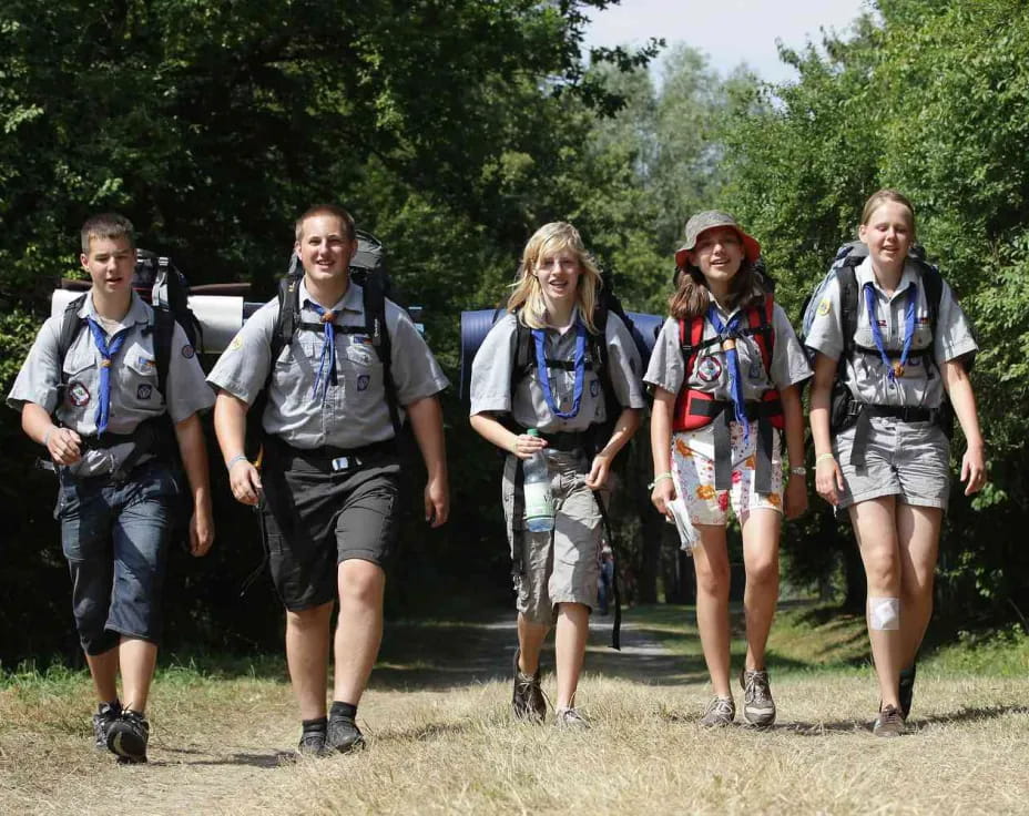 a group of people wearing backpacks