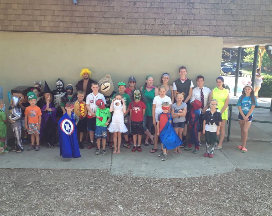 a group of people posing for a photo