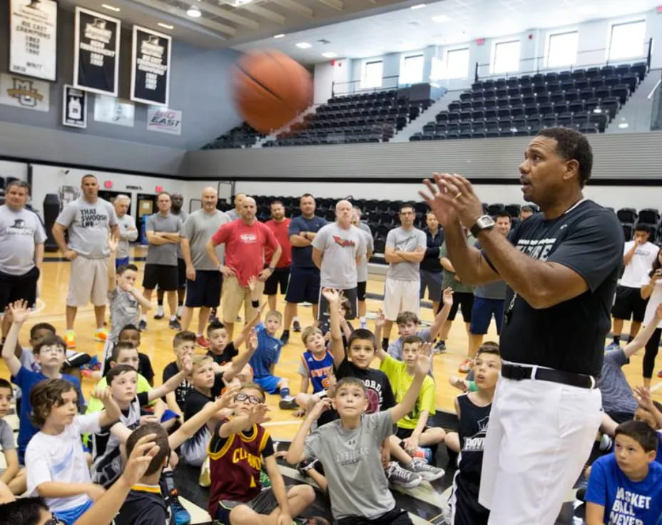 a person shooting a basketball