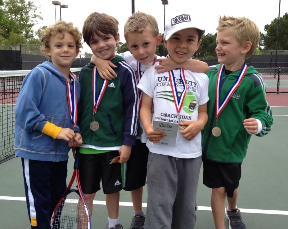 a group of boys posing for a picture