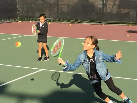 a person playing tennis