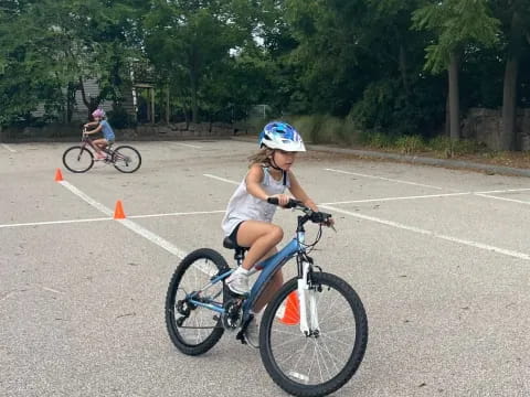 a girl riding a bike