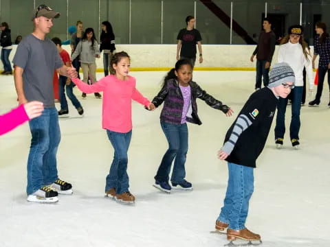 a group of people ice skating