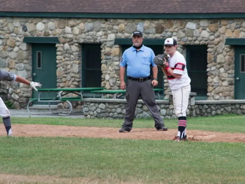 a baseball player prepares to throw a baseball