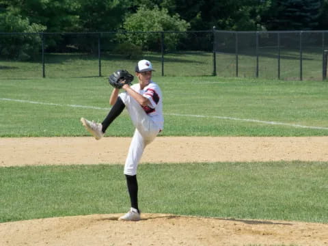 a baseball player throwing a ball