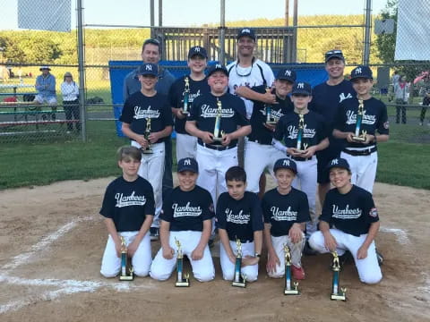 a group of baseball players posing for a photo